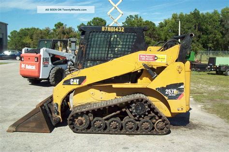 stuck bucket release skid steer caterpillar 0299 d|Troubleshooting JRB Quick Coupler: Stuck Pins & Hydraulic .